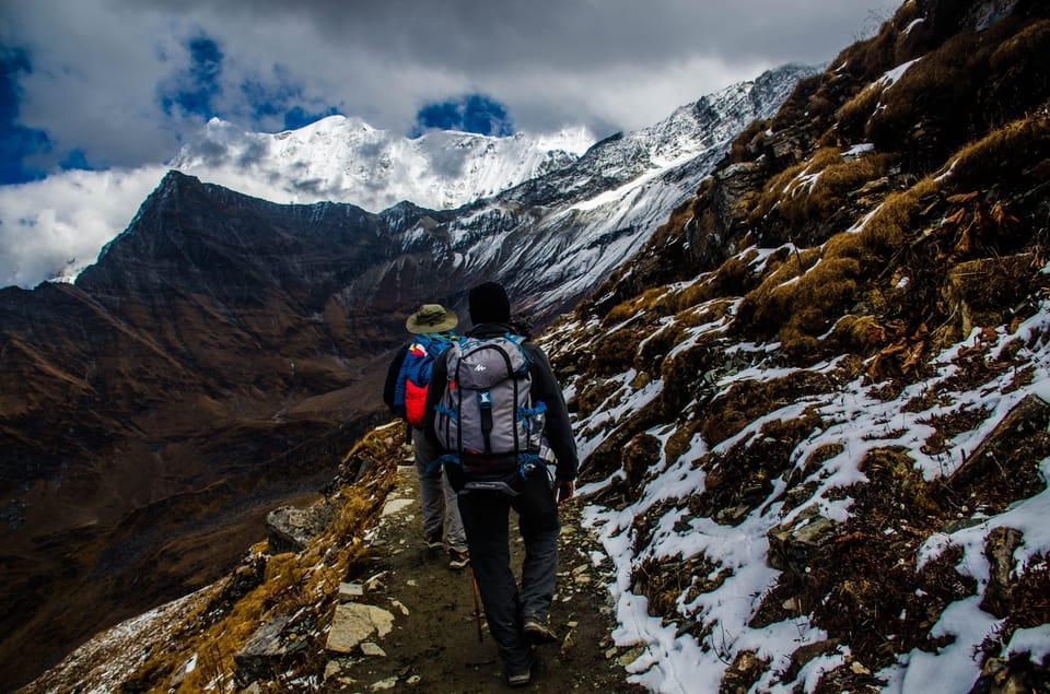 Mountain climbers approaching point lenana on mount kenya